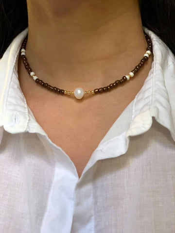 Brown choker with one pearl