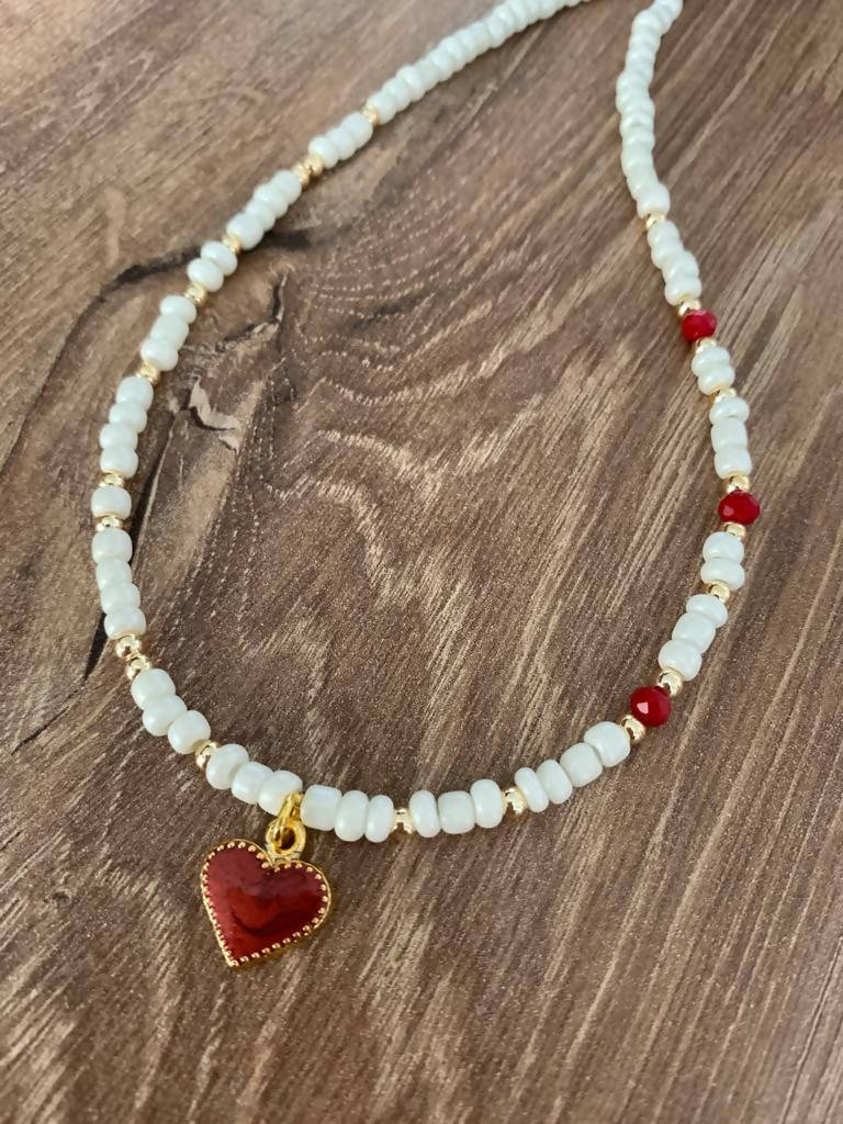 White choker with red heart