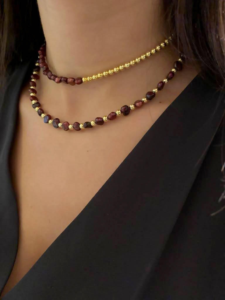 Red freshwater pearl choker with gold color beads all around