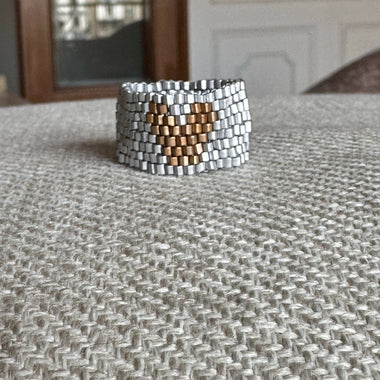 The PUT A RING ON IT collection: Heart Series, golden on silver, 8 rows!