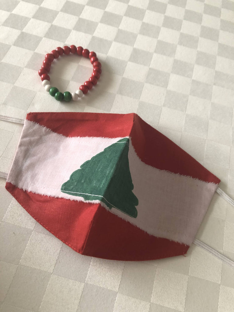 Beirut Flag Mask- Oumnia by Nivine Maktabi