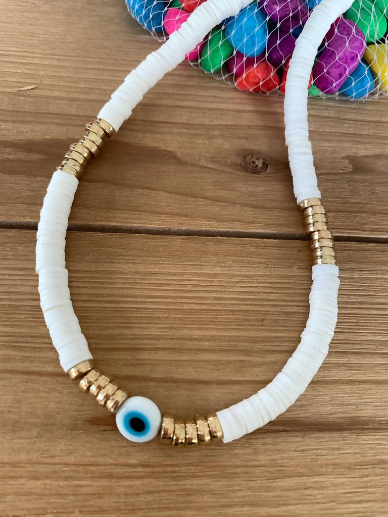White surf with evil eye